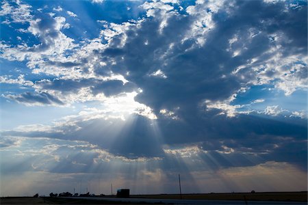 estados meridionales - Sunrays Breaking Through Clouds Foto de stock - Con derechos protegidos, Código: 700-06037903