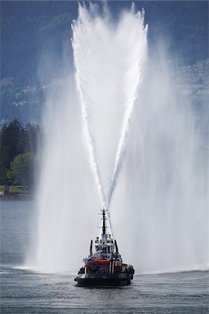 spraying - Fireboat in Burrard Inlet, Vancouver, British Columbia, Canada Stock Photo - Rights-Managed, Code: 700-06038136