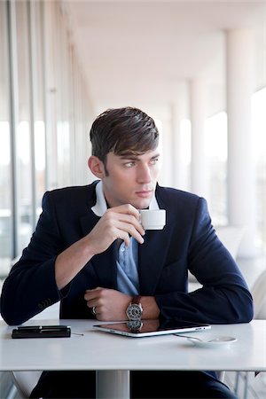 person drink cup of coffee - Businessman Drinking Coffee Stock Photo - Rights-Managed, Code: 700-06038141