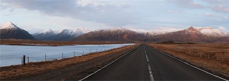 Long Straight Road with Snow Capped Mountains Stock Photo - Rights-Managed, Code: 700-06059832