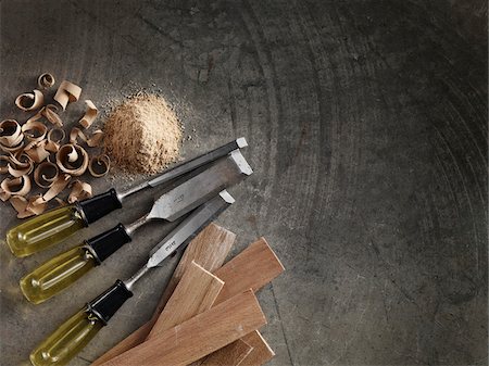 Chisels and Wood Pieces on Cement Floor Stock Photo - Rights-Managed, Code: 700-06119528