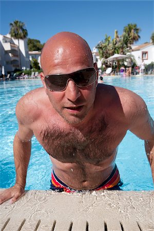 Homme dans la piscine Photographie de stock - Rights-Managed, Code: 700-06119650