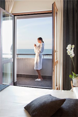 Woman Having Morning Coffee on Balcony Stock Photo - Rights-Managed, Code: 700-06119744