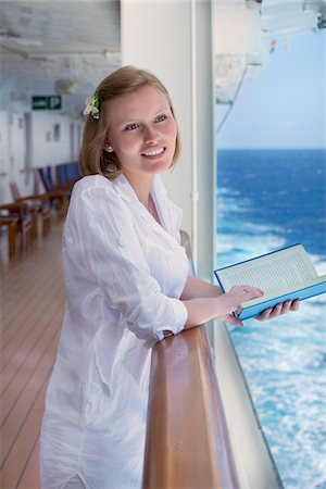 fermacapelli - Teenage Girl Reading Book on Cruise Ship Fotografie stock - Rights-Managed, Codice: 700-06190531