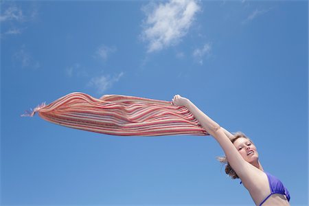 Teenage Girl Holding Scarf Out in Wind Stock Photo - Rights-Managed, Code: 700-06190533