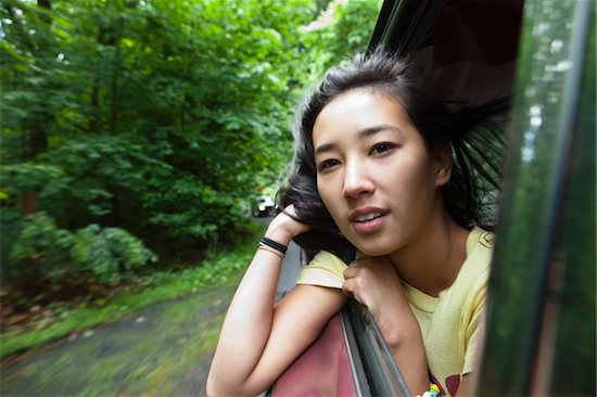 Young Woman Looking Out Car Window Stock Photo - Premium Rights-Managed, Artist: Ty Milford, Image code: 700-06190610