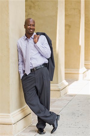 picture bald man suit - Portrait of Businessman Leaving Against Column Stock Photo - Rights-Managed, Code: 700-06282128