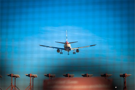 Avion atterrissait à l'aéroport d'Heathrow, London, UK Photographie de stock - Rights-Managed, Code: 700-06334447