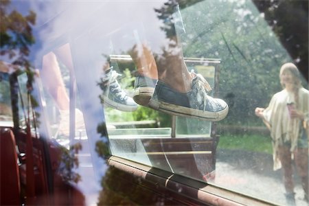 foot in sneakers - Group of People Sitting on Car Roof Stock Photo - Rights-Managed, Code: 700-06334615