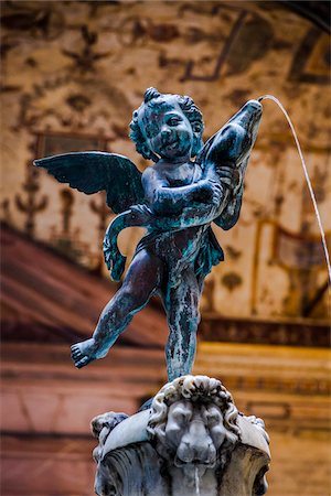 estatueta - Putto with Dolphin, Palazzo Vecchio, Florence, Tuscany, Italy Foto de stock - Direito Controlado, Número: 700-06334694