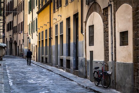 people walking and city - Man Walking on Narrow Street, Florence, Tuscany, Italy Stock Photo - Rights-Managed, Code: 700-06334756