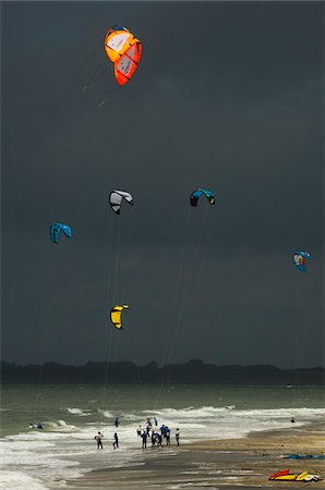 Kite Surfing on Beach with Stormy Sky Stock Photo - Rights-Managed, Code: 700-06368348