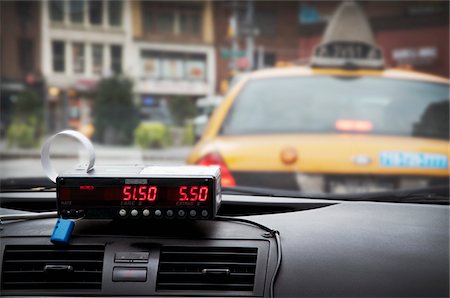 Interior of Taxi Cab with Meter Running Foto de stock - Direito Controlado, Número: 700-06397697