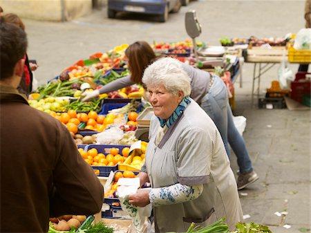 farmers market female - vendors sell vegetables at village farmers market, Cortona, Tuscany, Italy Stock Photo - Rights-Managed, Code: 700-06452065