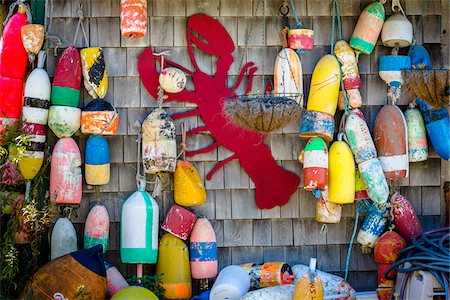 pêche (industrie) - Buoys and Red Lobster Cut-Out Hanging on Outer Wall of Building, Southwest Harbor, Mount Desert Island, Maine, USA Photographie de stock - Rights-Managed, Code: 700-06465724