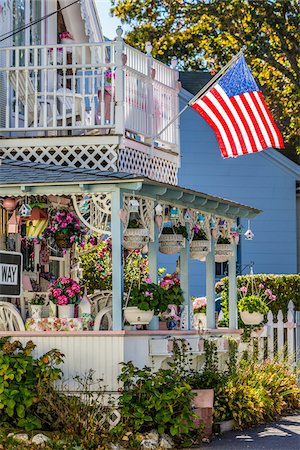 House with Many Hanging Planters and American Flag, Wesleyan Grove, Camp Meeting Association Historical Area, Oak Bluffs, Martha's Vineyard, Massachusetts, USA Photographie de stock - Rights-Managed, Code: 700-06465752