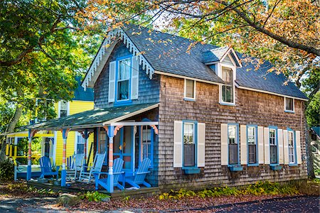 Cottage with Chairs on Porch, Wesleyan Grove, Camp Meeting Association Historical Area, Oak Bluffs, Martha's Vineyard, Massachusetts, USA Photographie de stock - Rights-Managed, Code: 700-06465763