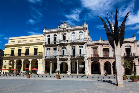 simsearch:700-06486567,k - Angela Landa Primary School (center) and other Buildings and Sculpture in Plaza Vieja, Havana, Cuba Stock Photo - Rights-Managed, Code: 700-06465914