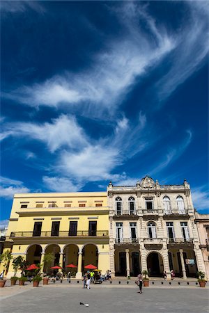 Restaurant and Buildings Lining Plaza Vieja, Havana, Cuba Stock Photo - Rights-Managed, Code: 700-06465913