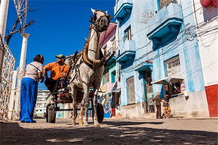 street neighbourhood north america - Low Angle View of Horse Drawn Cart on Callejon de Hamel, Havana, Cuba Stock Photo - Rights-Managed, Code: 700-06465936