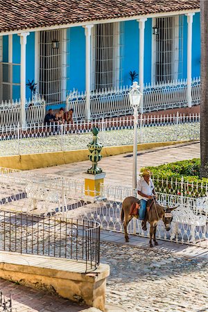 simsearch:700-06465992,k - Man on Donkey in Plaza Mayor, Trinidad, Cuba Fotografie stock - Rights-Managed, Codice: 700-06465966