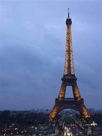 Overview of the Eiffel Tower with Traffic with Overcast Sky in the Evening, Paris, France Stock Photo - Rights-Managed, Code: 700-06531932