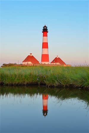 Westerhever Lighthouse Reflected in Pond at Dusk, Westerhever, Tating, Schleswig-Holstein, Germany Photographie de stock - Rights-Managed, Code: 700-06576215