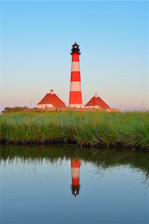 simsearch:600-06571080,k - Westerhever Lighthouse Reflected in Pond at Dusk, Westerhever, Tating, Schleswig-Holstein, Germany Stockbilder - Lizenzpflichtiges, Bildnummer: 700-06576215