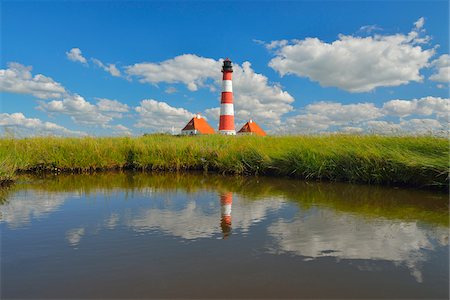 pond plant - Westerhever Lighthouse Reflected in Pond in Summer, Westerhever, Tating, Schleswig-Holstein, Germany Stock Photo - Rights-Managed, Code: 700-06576211