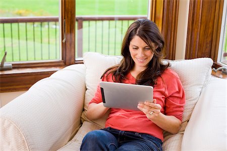 Woman Using iPad at Home Stock Photo - Rights-Managed, Code: 700-06645605