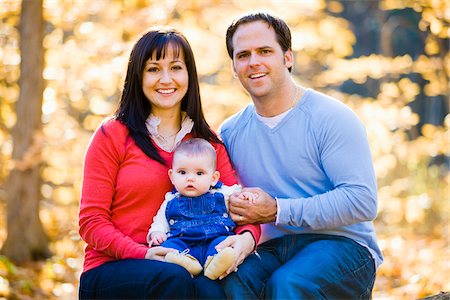 Portrait of Couple Holding their Four Month Old Daughter, at Scanlon Creek Conservation Area, near Bradford, Ontario, Canada Stock Photo - Rights-Managed, Code: 700-06674978