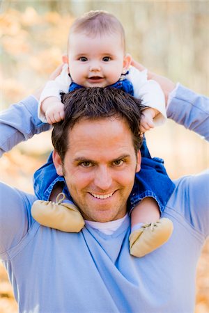 piggyback ride - Portrait of Man Carrying Four Month Old Daughter on Shoulders, at Scanlon Creek Conservation Area, near Bradford, Ontario, Canada Stock Photo - Rights-Managed, Code: 700-06674982