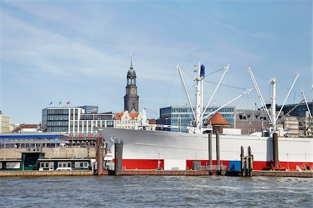 simsearch:700-05609803,k - Ship in Harbor with Steeple of St Michaelis Church in Background, Hamburg, Germany Stock Photo - Rights-Managed, Code: 700-06679346