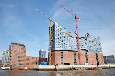 Elbe Philharmonic Hall with Construction Cranes on Elbe River, HafenCity, Hamburg, Germany Photographie de stock - Rights-Managed, Code: 700-06679343