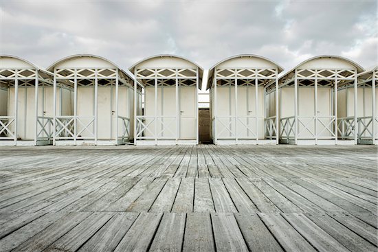 WOODEN BEACH HUTS ON THE BEACH ON A WINTER DAY, OSTIA LIDO, ROME, ITALY Stock Photo - Premium Rights-Managed, Artist: Siephoto, Image code: 700-06685216