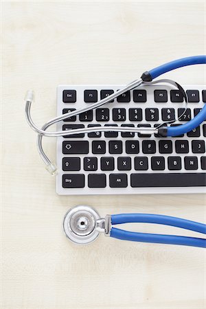 still life of a computer keyboard and stethoscope Photographie de stock - Rights-Managed, Code: 700-06701941