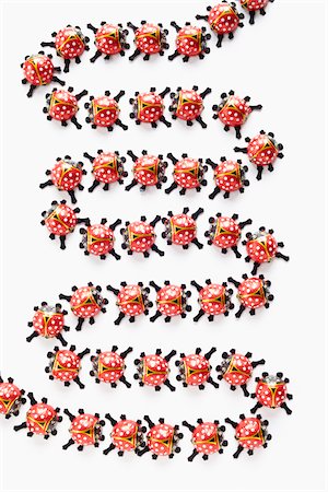 followers - still life of ladybugs chocolate on white background Stock Photo - Rights-Managed, Code: 700-06714038