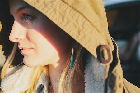 Close-up of Young Woman Wearing Jacket Hood Fotografie stock - Rights-Managed, Codice: 700-06786685