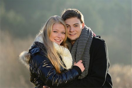 Young couple hugging in an autumn landscape, Bavaria, Germany Foto de stock - Con derechos protegidos, Código: 700-06786731