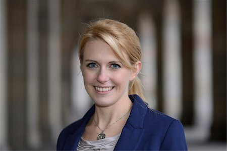 smiling blond woman in business suit - Portrait of a young blond business woman, Bavaria, Germany Stock Photo - Rights-Managed, Code: 700-06786883