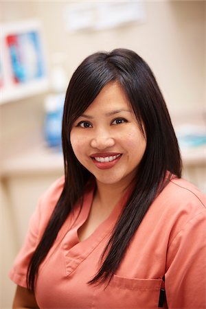 filipino ethnicity - Portrait of Female Dental Hygienist in Examination Room. Photographie de stock - Rights-Managed, Code: 700-06786919