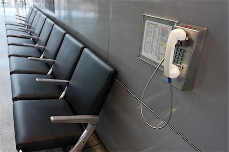 White courtesy telephone and seating at airport, San Francisco International Airport, California, USA Stock Photo - Rights-Managed, Code: 700-06803867