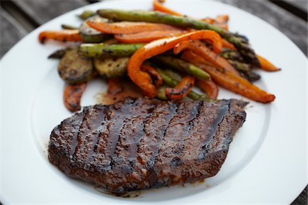 steak on grill - Organic Grilled Vegetables with Organic Bison Steak on Plate. Stock Photo - Rights-Managed, Code: 700-06841600