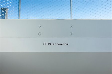 surveillance camera - Sign advising the presence of closed circuit tv, london, uk Foto de stock - Con derechos protegidos, Código: 700-06892619