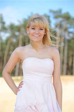 Portrait of Young Woman at Beach in Summer, Bavaria, Germany Stock Photo - Rights-Managed, Code: 700-06936080