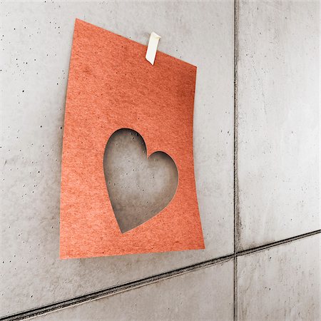 3d-illustraion of a heart shaped paper on concrete wall Stock Photo - Rights-Managed, Code: 700-06936142