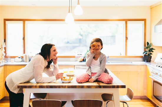 Mom and daughter in a modern kitchen, Oregon, USA Stock Photo - Premium Rights-Managed, Artist: Boone Rodriguez, Image code: 700-06961896