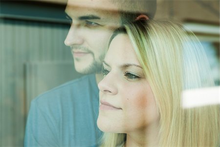 portrait of man side view - Close-up of Young Couple Looking out Window, Mannheim, Baden-Wurttemberg, Germany Stock Photo - Rights-Managed, Code: 700-06962026