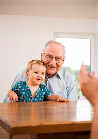 family indoors old - Senior Man holding Baby Girl, Mannheim, Baden-Wurttemberg, Germany Stock Photo - Rights-Managed, Code: 700-06962190