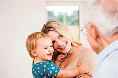 eyeglasses people smiling - Young Woman and Baby Girl with Senior Man, Mannheim, Baden-Wurttemberg, Germany Stock Photo - Rights-Managed, Code: 700-06962205